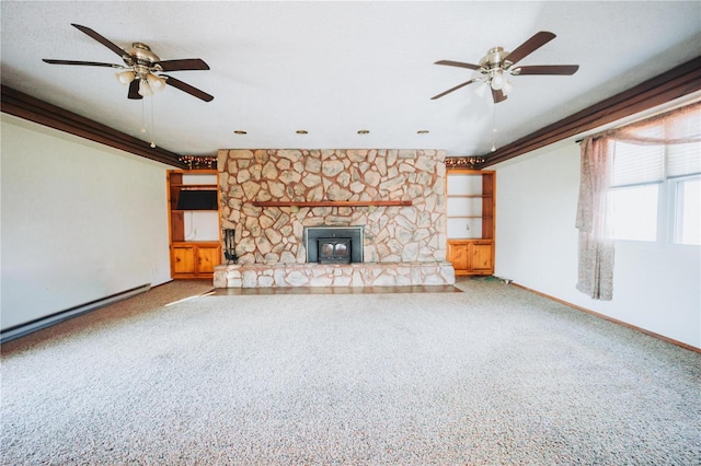 unfurnished living room featuring carpet floors, a stone fireplace, ceiling fan, and ornamental molding