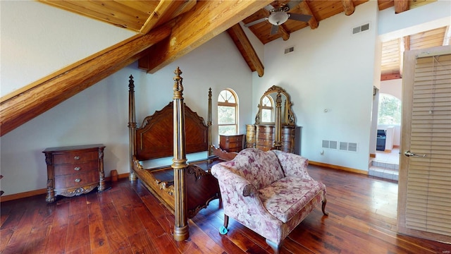 interior space with a healthy amount of sunlight, beamed ceiling, high vaulted ceiling, and dark hardwood / wood-style flooring