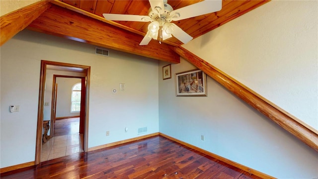 interior space featuring wood ceiling, vaulted ceiling, dark hardwood / wood-style floors, and ceiling fan