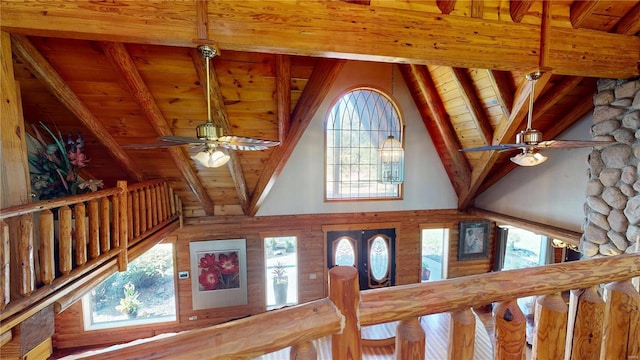 room details with ceiling fan, beamed ceiling, and wooden ceiling