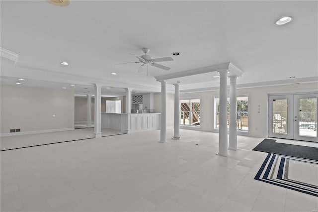 interior space featuring ceiling fan, light tile patterned flooring, crown molding, and french doors