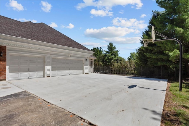 exterior space with a garage