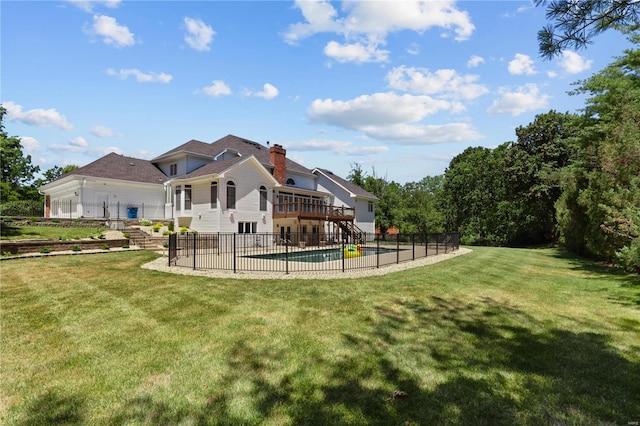 view of yard featuring a swimming pool side deck