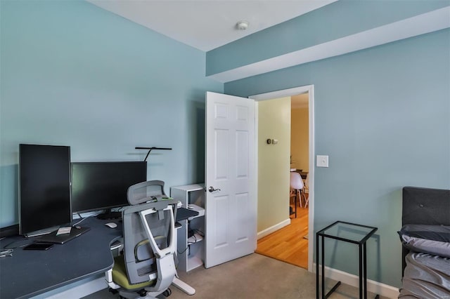 exercise room featuring wood-type flooring