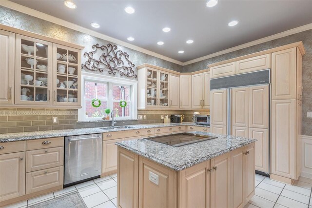 kitchen with crown molding, stainless steel dishwasher, a center island, and light tile patterned floors