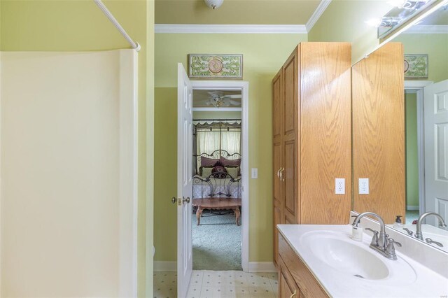 bathroom with tile patterned floors and vanity