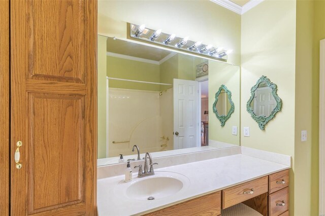 bathroom featuring vanity and ornamental molding