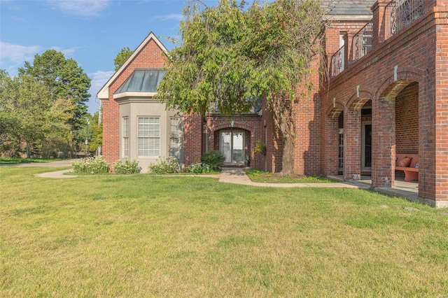 tudor house with a front lawn