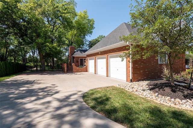 view of home's exterior featuring a garage