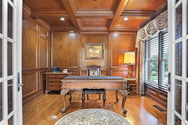 office area featuring wood ceiling, plenty of natural light, ornamental molding, beam ceiling, and coffered ceiling