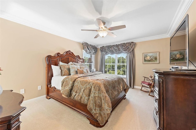 bedroom with ceiling fan, light colored carpet, and crown molding