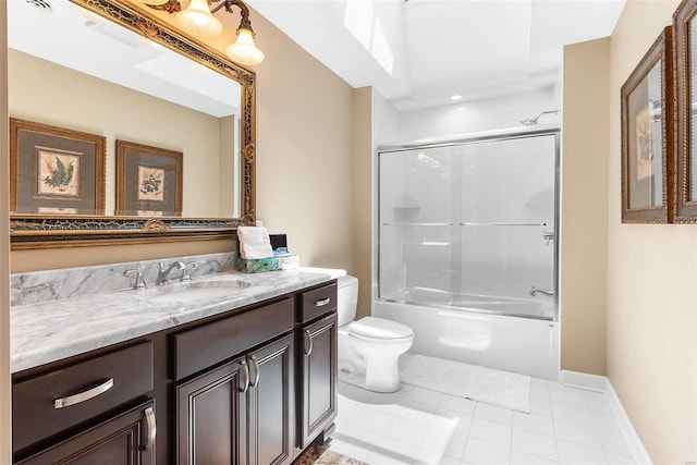 full bathroom featuring combined bath / shower with glass door, vanity, tile patterned floors, and toilet