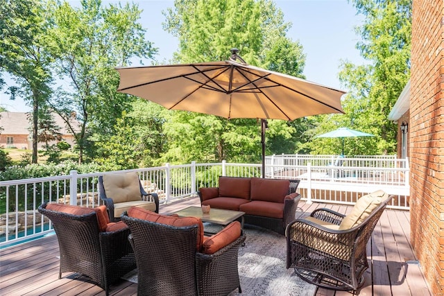 wooden deck featuring outdoor lounge area