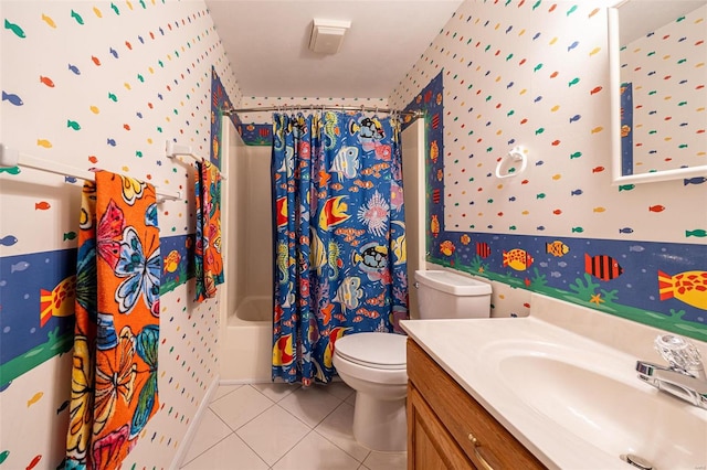 full bathroom featuring wallpapered walls, toilet, shower / tub combo, tile patterned floors, and vanity