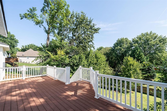 deck featuring a lawn