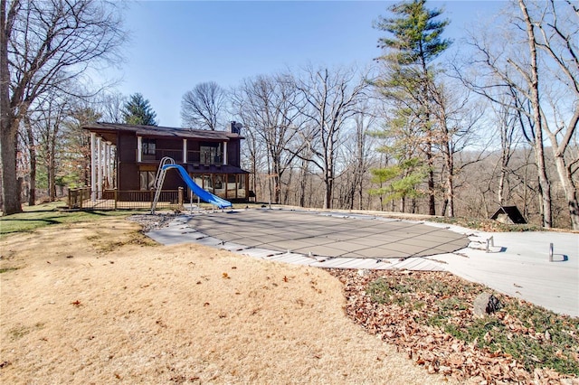 view of yard featuring a pool side deck