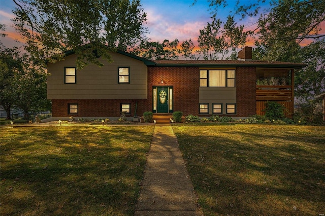 bi-level home with a yard