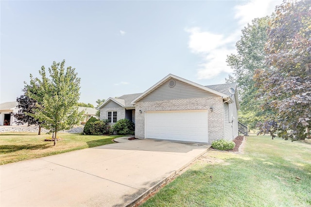 ranch-style home with a front yard and a garage