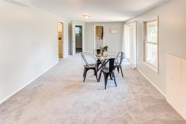 view of carpeted dining room