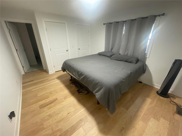 bedroom featuring light hardwood / wood-style flooring