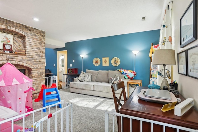 living room with carpet and a fireplace