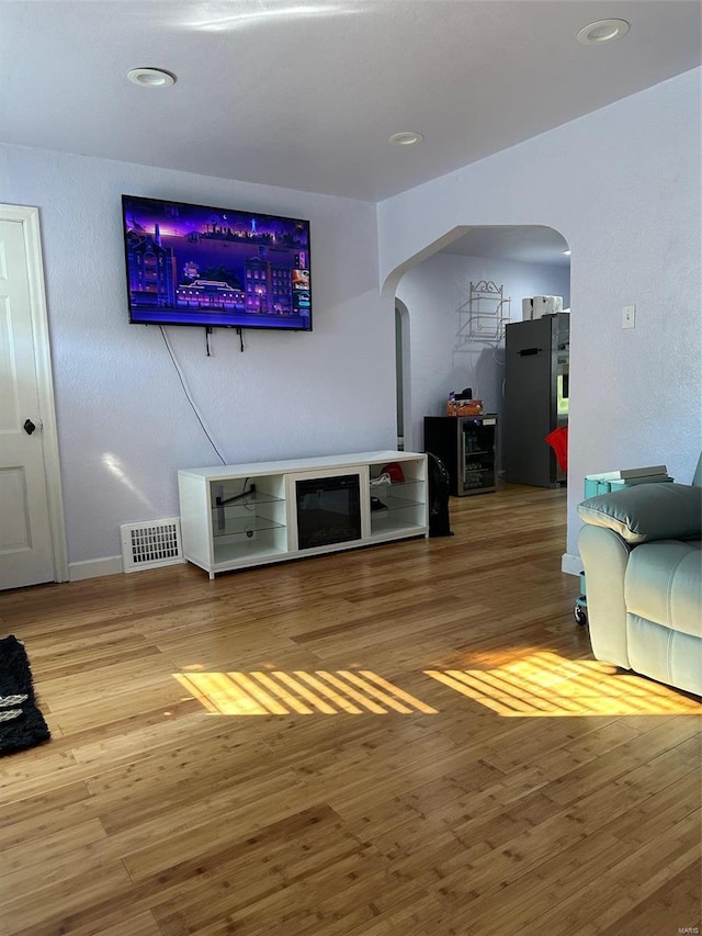 living room with hardwood / wood-style floors