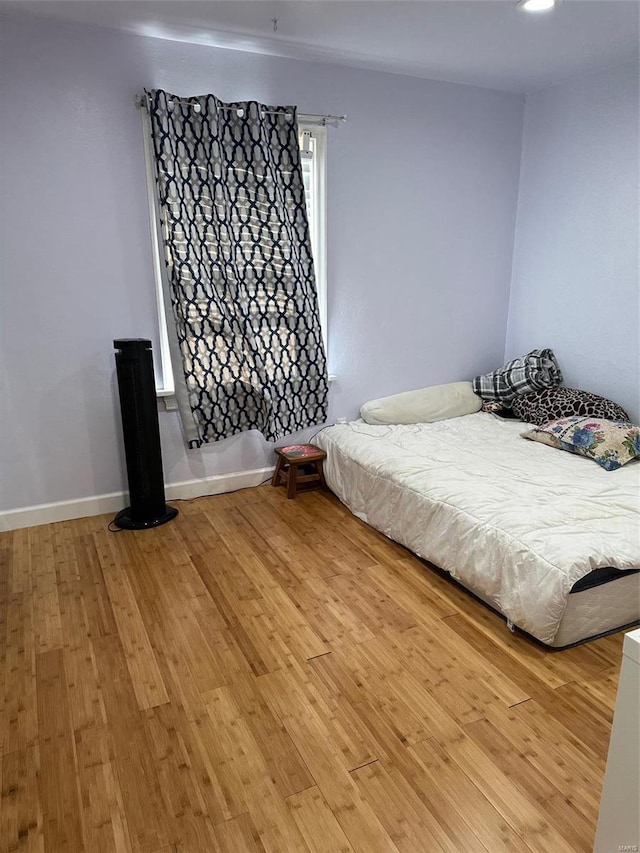 unfurnished bedroom featuring light hardwood / wood-style flooring