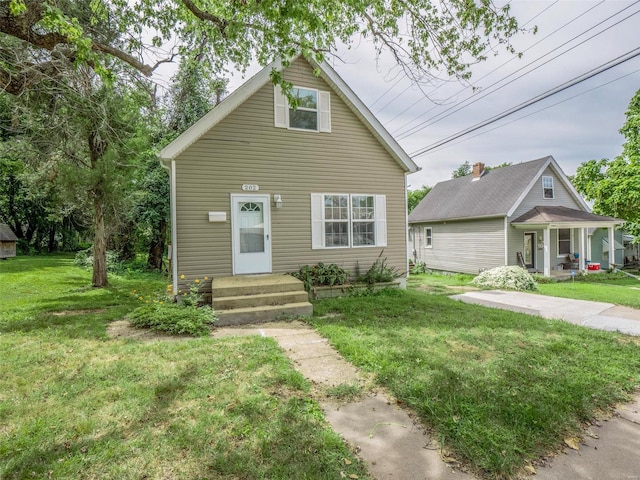 view of front of house featuring a front lawn