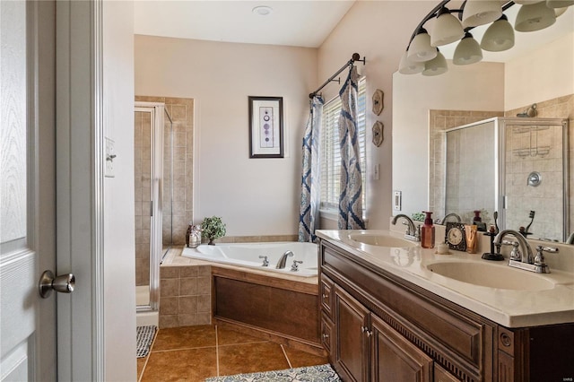 bathroom with vanity, plus walk in shower, and tile patterned flooring