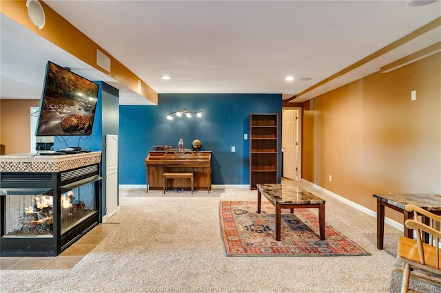 living room featuring light carpet