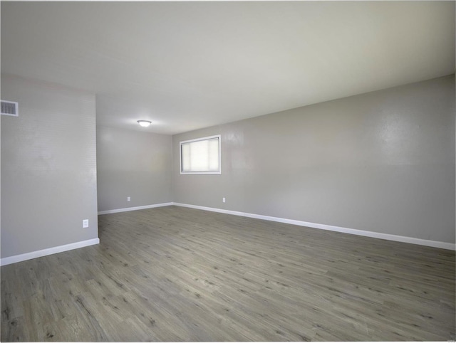 spare room with light wood-type flooring