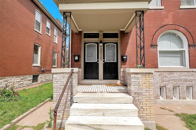 doorway to property with a porch