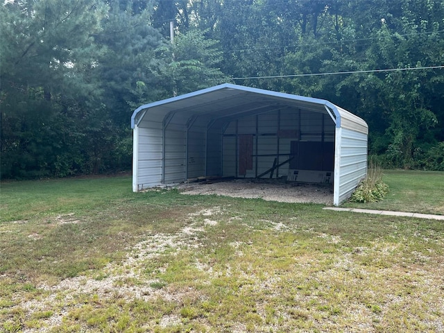 view of outdoor structure with a yard and a carport