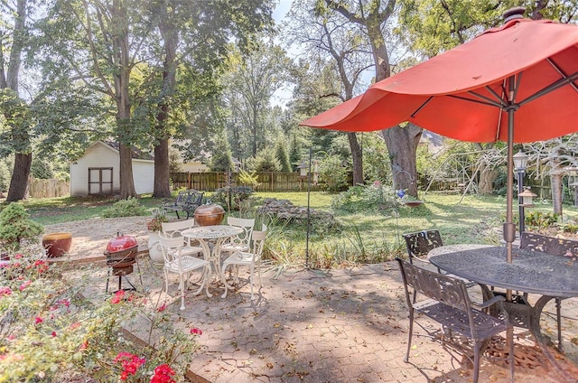 view of patio with a shed