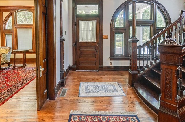 entrance foyer featuring hardwood / wood-style floors