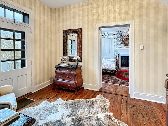 sitting room featuring hardwood / wood-style floors