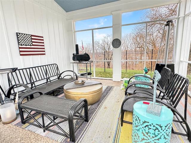 sunroom with vaulted ceiling