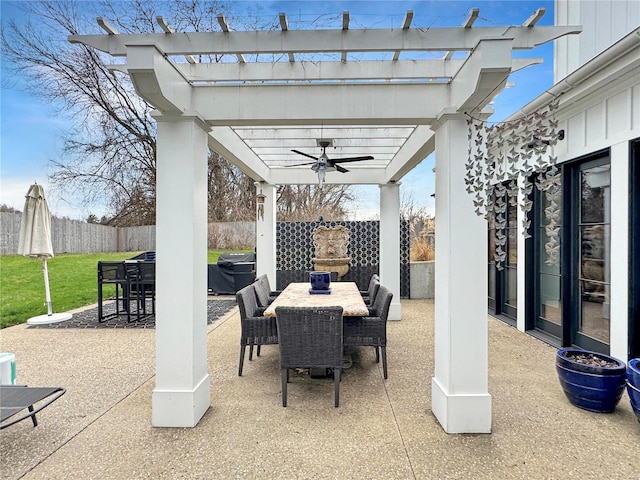 view of patio featuring area for grilling, ceiling fan, and a pergola