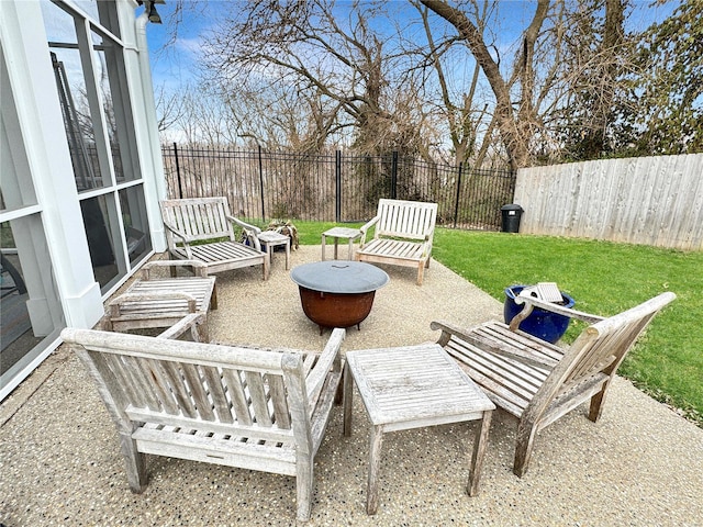 view of patio featuring an outdoor fire pit