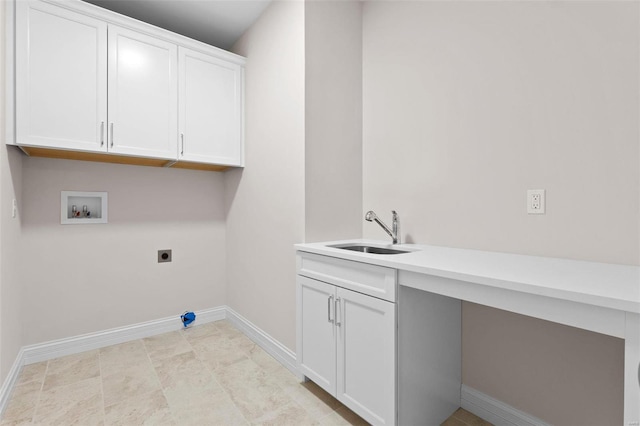 laundry room with cabinets, sink, washer hookup, and hookup for an electric dryer