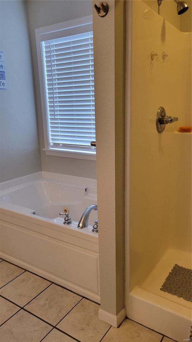 bathroom with plus walk in shower and tile patterned floors