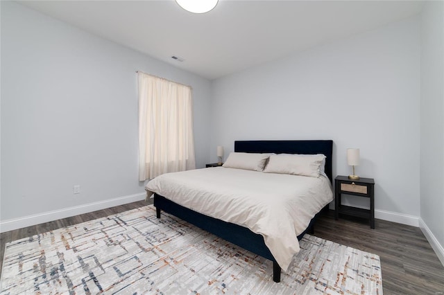 bedroom with wood-type flooring