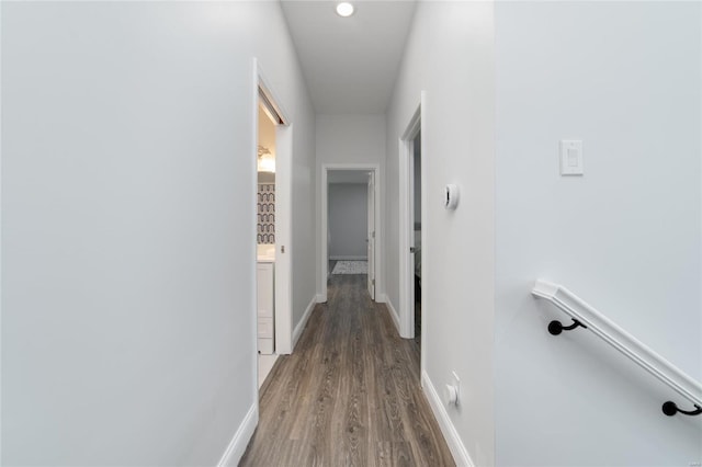 hallway featuring wood-type flooring