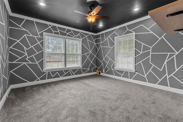 carpeted spare room featuring baseboards, crown molding, recessed lighting, and a ceiling fan