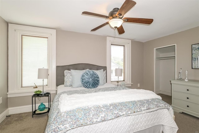 bedroom with carpet, a closet, and ceiling fan