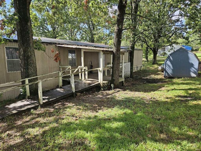 view of yard with a wooden deck