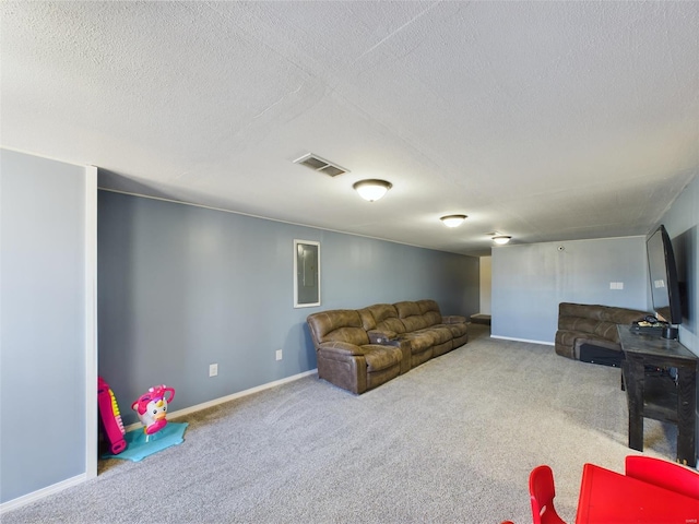 living room featuring a textured ceiling and carpet floors