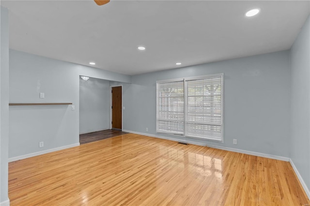 spare room featuring light wood-type flooring