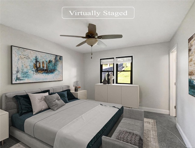 bedroom featuring ceiling fan and carpet floors