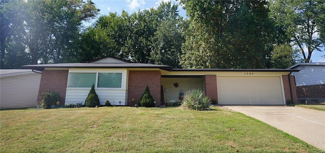 single story home with a garage and a front yard